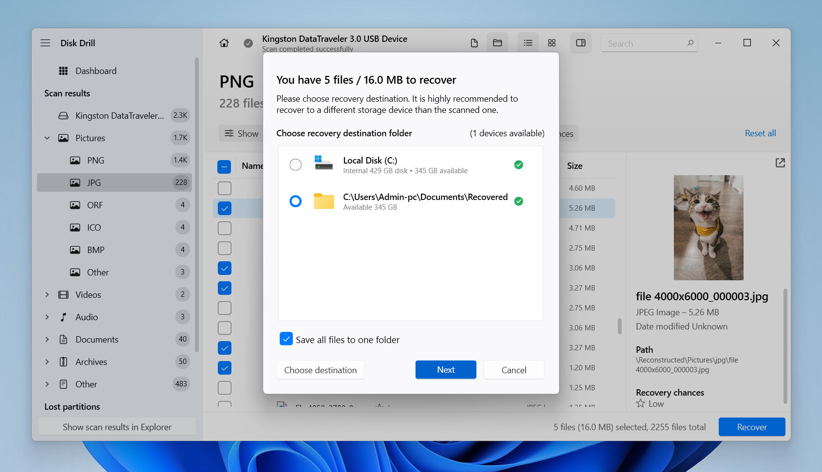 Disk Drill dialog for selecting recovery destination, recommending a different drive